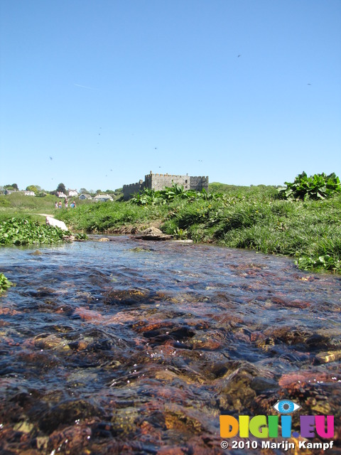 SX14430 Manorbier castle from stream running towards Manorbier Bay